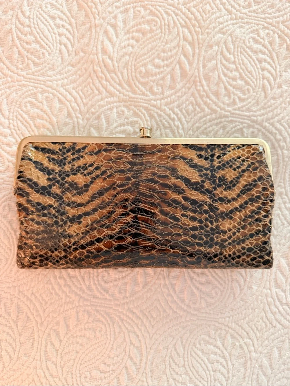 HOBO Animal-Print Snake-Embossed Frame Clutch in Black and Brown